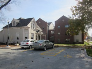 It is easy to see how the house could have been torn down and used as parking for the university's new dormitory.